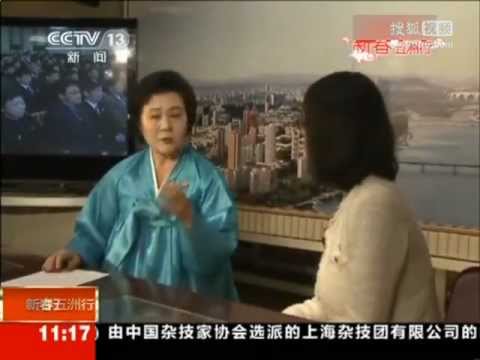 北朝鮮の看板アナが中国のTV取材に答えるwidth=190